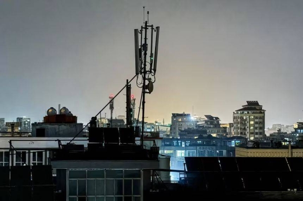 A telecommunications antenna installed for internet services is seen on the rooftop of a house in Kabul, on Monday, following a nation-wide telecom outage