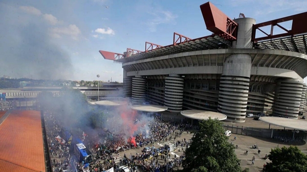 Inter Milan fans celebrate at Milan's San Siro stadium, Saturday, May 8, 2021